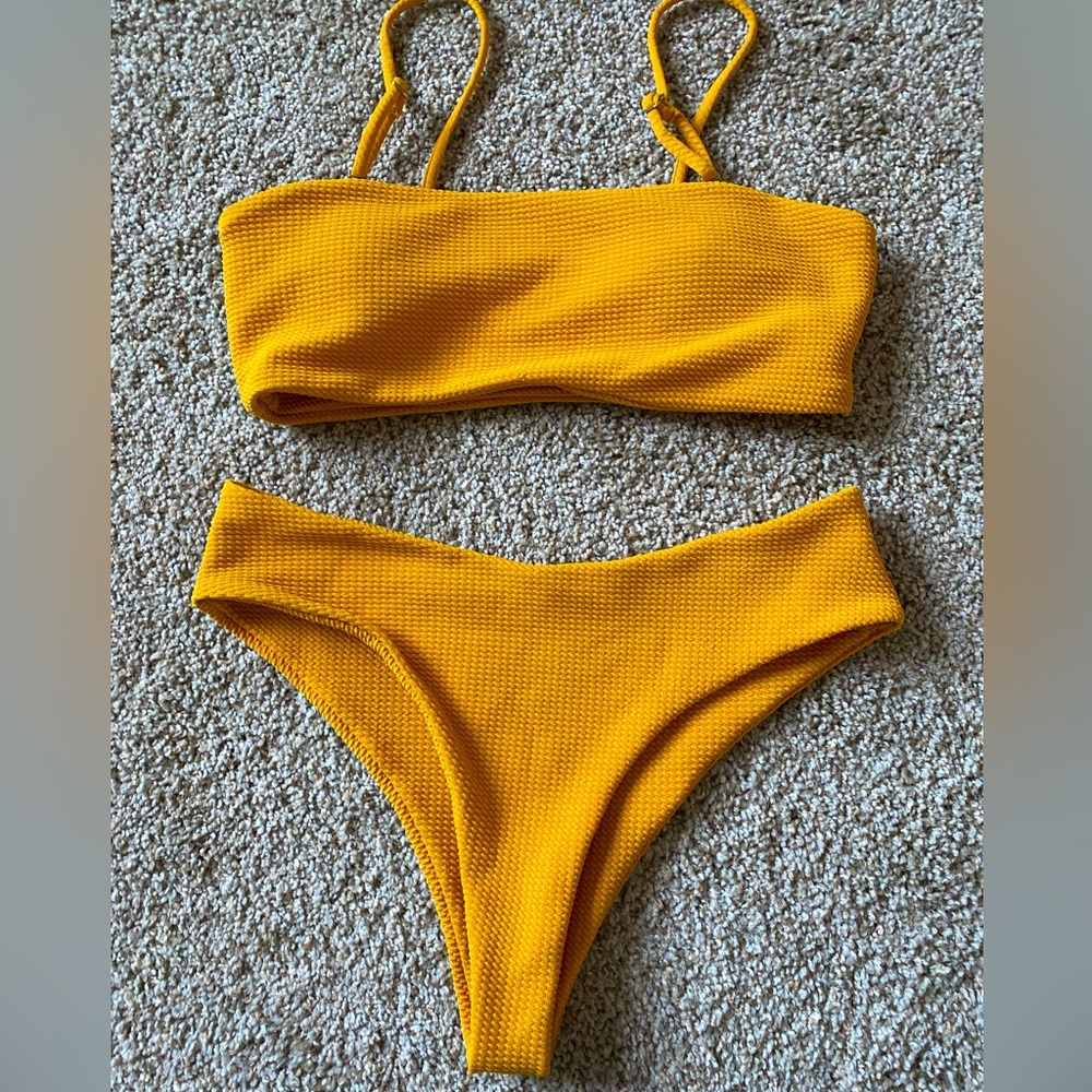 Two-piece mustard swimsuit, only worn once!